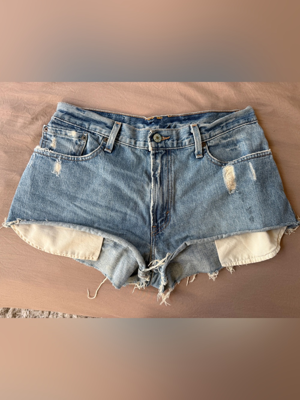 Levi's Light Blue Distressed Denim Cutoff Shorts